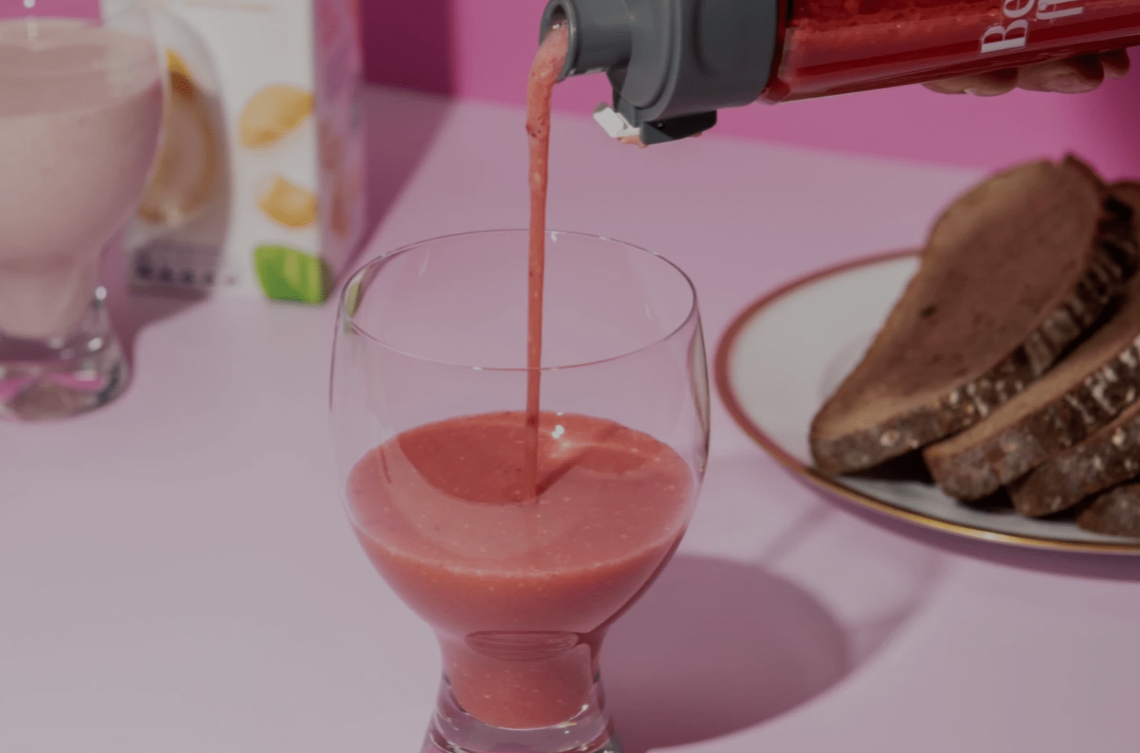 Berry Flirt smoothie pouring into a glass